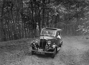 Standard competing in the B&HMC Brighton-Beer Trial, Fingle Bridge Hill, Devon, 1934. Artist: Bill Brunell.