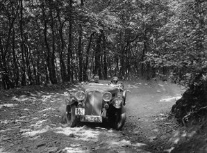 Triumph competing in the B&HMC Brighton-Beer Trial, Fingle Bridge Hill, Devon, 1934. Artist: Bill Brunell.