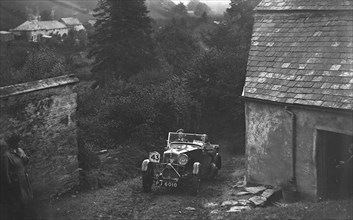 1932 Wolseley Hornet of N Tracey competing in the JCC Lynton Trial, 1932. Artist: Bill Brunell.