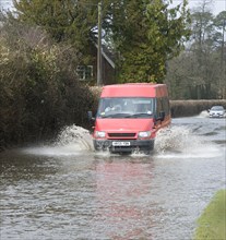 Van driving through Floods at Beauleu 2008. Artist: Unknown.
