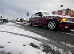 BMW driving in slush, Blackfield 2009 Artist: Unknown.