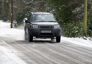 2001 Land Rover Freelander driving on icy road Artist: Unknown.