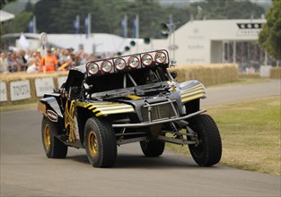 2009 Trophy Truck off road racer at Goodwood Artist: Unknown.