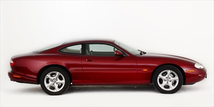 1999 Jaguar XK8 coupe Artist: Unknown.