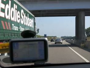 Passing Eddie Stobart truck on the A46 with satnav screen on windscreen