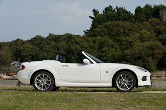 2014 Mazda MX5 Roadster Coupe Artist: Unknown.