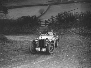 MG PB of K Scales competing in the MG Car Club Midland Centre Trial, 1938. Artist: Bill Brunell.