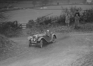 Austin 7 Grasshopper of Alf Langley competing at the MG Car Club Midland Centre Trial, 1938. Artist: Bill Brunell.