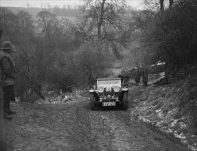 Alvis Silver Eagle of EW Bass competing in the Sunbac Colmore Trial, Gloucestershire, 1933. Artist: Bill Brunell.
