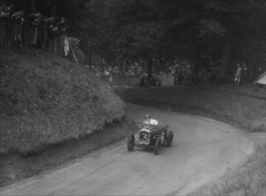 Austin Ulster TT type competing in the MAC Shelsley Walsh Speed Hill Climb, Worcestershire, 1935. Artist: Bill Brunell.