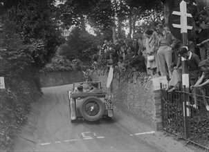 MG TA of CG Gibbs competing in the MCC Torquay Rally, 1938. Artist: Bill Brunell.