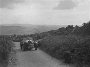 Morgan 4/4 of WA Goodall competing in the MCC Torquay Rally, 1938. Artist: Bill Brunell.