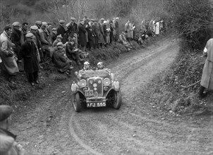 Singer Le Mans of ET Ingham competing in the MCC Lands End Trial, 1935. Artist: Bill Brunell.