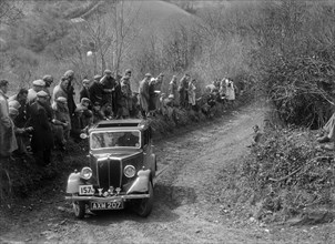 Jowett of GA Ladwig competing in the MCC Lands End Trial, 1935. Artist: Bill Brunell.