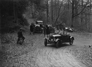 Wolseley 11 competing in the Sunbeam Motor Car Club Bognor Trial, 1929. Artist: Bill Brunell.