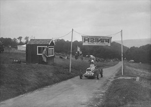 MG racing single-seater at the finish of the Shelsley Walsh Hillclimb, Worcestershire, 1935. Artist: Bill Brunell.