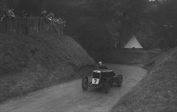 MG C type of Barbara Skinner competing in the Shelsley Walsh Hillclimb, Worcestershire, 1935. Artist: Bill Brunell.
