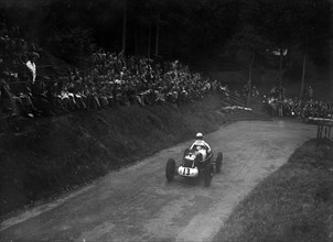 Single-seater MG R type competing in the Shelsley Walsh Hillclimb, Worcestershire, 1935. Artist: Bill Brunell.