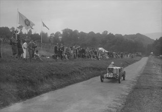 Singer competing in the Shelsley Walsh Hillclimb, Worcestershire, 1935. Artist: Bill Brunell.