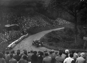 Alvis competing in the Shelsley Walsh Hillclimb, Worcestershire, 1935. Artist: Bill Brunell.