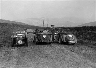 MG F type, Wolseley Hornet and MG Magnette at the Sunbac Inter-Club Team Trial, 1935. Artist: Bill Brunell.