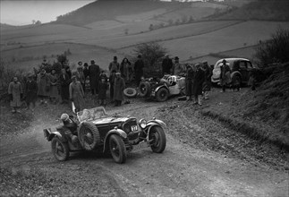 Frazer-Nash TT replica of TN Clare competing in the MG Car Club Midland Centre Trial, 1938. Artist: Bill Brunell.