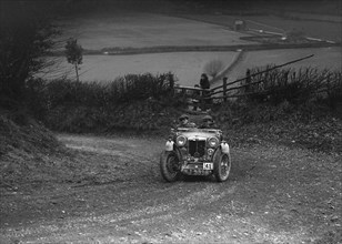 MG PB of WJ Green competing in the MG Car Club Midland Centre Trial, 1938. Artist: Bill Brunell.