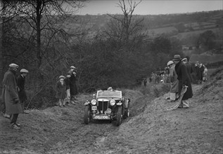 MG TA of F Wallace competing in the MG Car Club Midland Centre Trial, 1938. Artist: Bill Brunell.