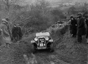 Singer of E Bunn competing in the MG Car Club Midland Centre Trial, 1938. Artist: Bill Brunell.