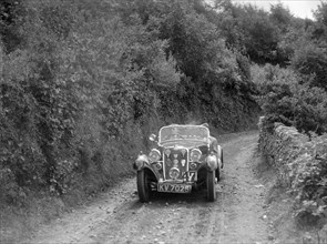 Singer Le Mans competing in the Mid Surrey Automobile Club Barnstaple Trial, 1934. Artist: Bill Brunell.