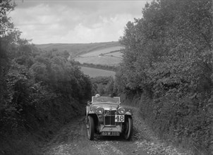 MG Magna competing in the Mid Surrey AC Barnstaple Trial, 1934. Artist: Bill Brunell.