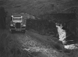 Kitty Brunell road testing a Standard Little Twelve saloon, c1932. Artist: Bill Brunell.