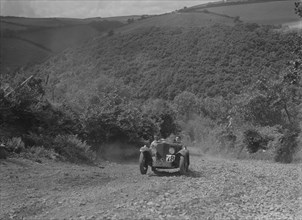 Rover Meteor Speed Twenty at the Mid Surrey AC Barnstaple Trial, Beggars Roost, Devon, 1934. Artist: Bill Brunell.