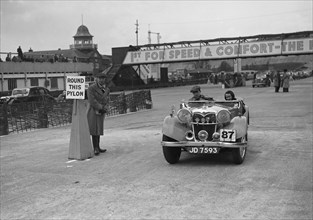 Riley Lynx competing in the JCC Rally, Brooklands, Surrey, 1939. Artist: Bill Brunell.