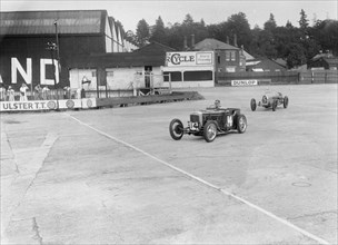 Frazer-Nash of RT Grogan leading Jack Lemon Burton's Bugatti T37, BARC meeting, Brooklands, 1933. Artist: Bill Brunell.
