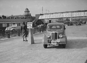 Standard competing in the JCC Rally, Brooklands, Surrey, 1939. Artist: Bill Brunell.
