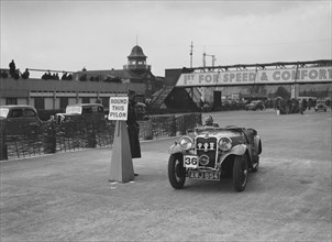 Singer sports competing in the JCC Rally, Brooklands, Surrey, 1939. Artist: Bill Brunell.