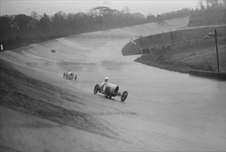 Two Bugattis racing at a BARC meeting, Brooklands, Surrey, 1931 Artist: Bill Brunell.