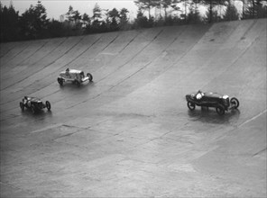 Salmson, Riley 9 Brooklands and Talbot 90 racing at a BARC meeting, Brooklands, Surrey, 1931 Artist: Bill Brunell.