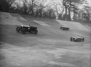 Vauxhall, Riley and Amilcar racing at a BARC meeting, Brooklands, Surrey, 1931 Artist: Bill Brunell.