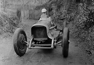 Charles Mortimer driving an offset-bodied single-seater MG KN Special, c1930s Artist: Bill Brunell.