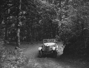 AC taking part in a motoring trial, c1930s. Artist: Bill Brunell.