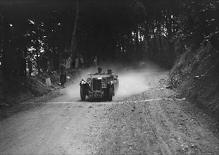 MG Magna taking part in a motoring trial, c1930s. Artist: Bill Brunell.