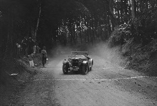 Riley Lynx taking part in a motoring trial, c1930s. Artist: Bill Brunell.