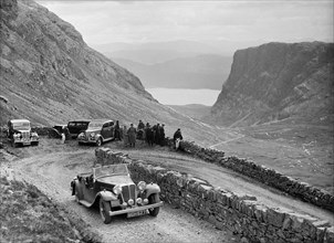 SS Jaguar 1 competing in the RSAC Scottish Rally, 1936. Artist: Bill Brunell.