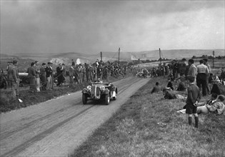 Frazer-Nash BMW competing in the Bugatti Owners Club Lewes Speed Trials, Sussex, 1937. Artist: Bill Brunell.