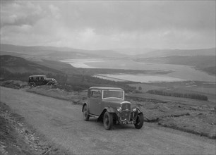 Rover coupe of G Ross competing in the RSAC Scottish Rally, 1934. Artist: Bill Brunell.