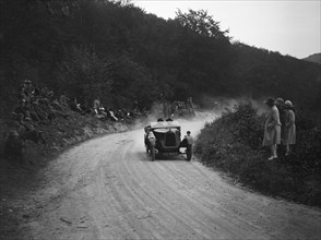 Talbot open 2-seater of Mrs Hawkes competing in a JCC hillclimb, South Harting, Sussex, 1922. Artist: Bill Brunell.