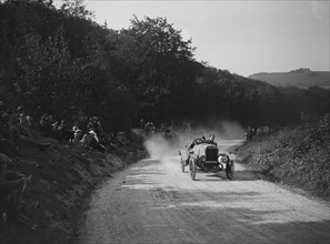 McKenzie of WF Knight competing in a JCC hillclimb, South Harting, Sussex, 1922. Artist: Bill Brunell.