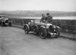 Amilcar and Riley 9 at the Ilkley & District Motor Club Trial, Fewston Reservoir, Yorkshire, 1930s. Artist: Bill Brunell.